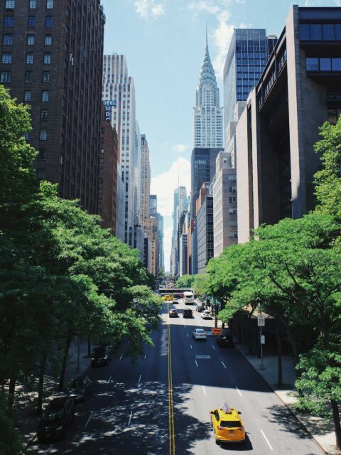 Best Places to Visit in New York: Iconic view of a New York City street with the Chrysler Building in the background.