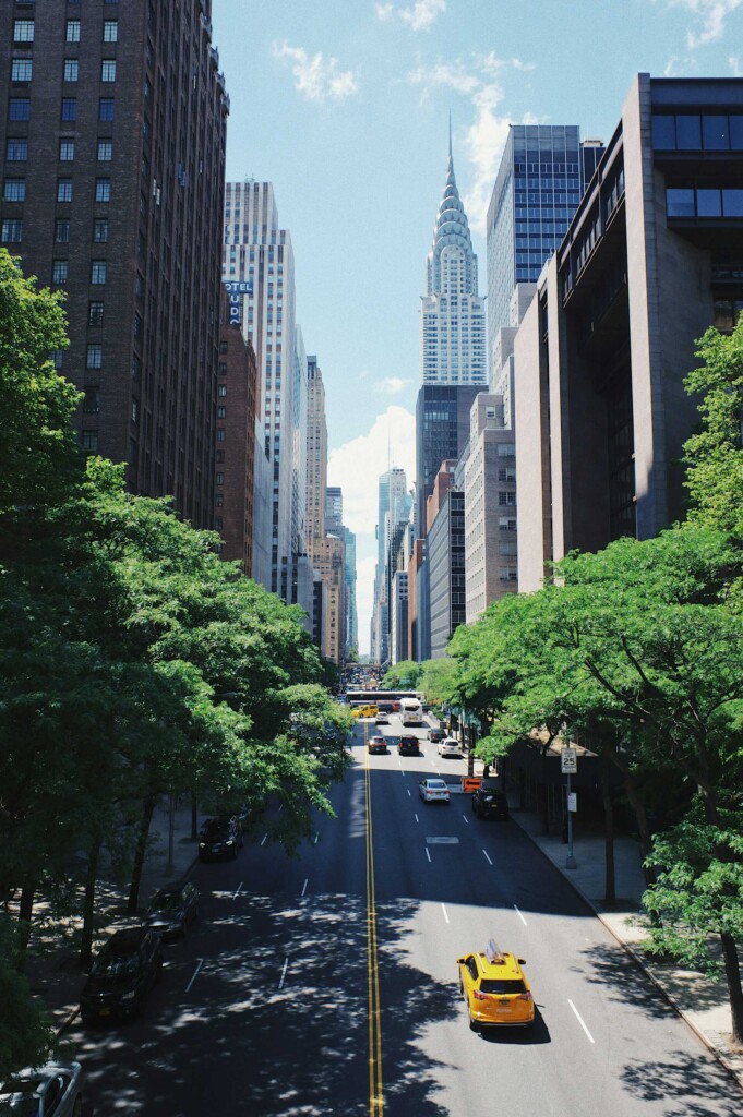 Best Places to Visit in New York: Iconic view of a New York City street with the Chrysler Building in the background.