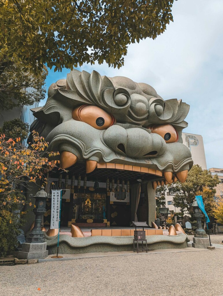 Osaka Japan travel guide: Namba Yasaka Shrine, featuring the massive lion head-shaped structure.