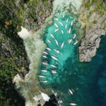 Philippines Travel Itinerary 3 Weeks: Stunning coastal view of El Nido, Palawan with clear blue waters and limestone cliffs