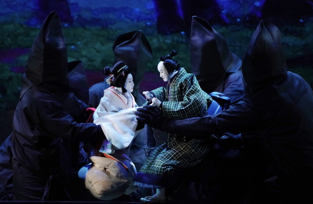 Things to do in Osaka Japan: Traditional Bunraku puppet performance at the National Bunraku Theater.