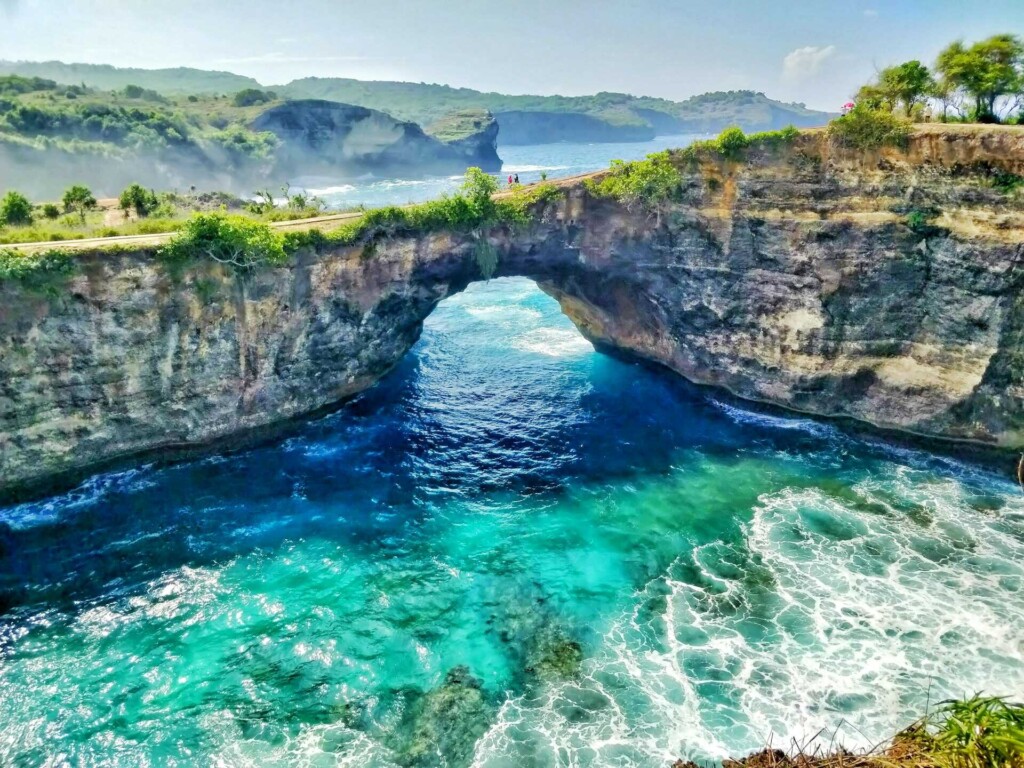 Bali Indonesia travel: The natural rock arch and turquoise waters of Broken Beach