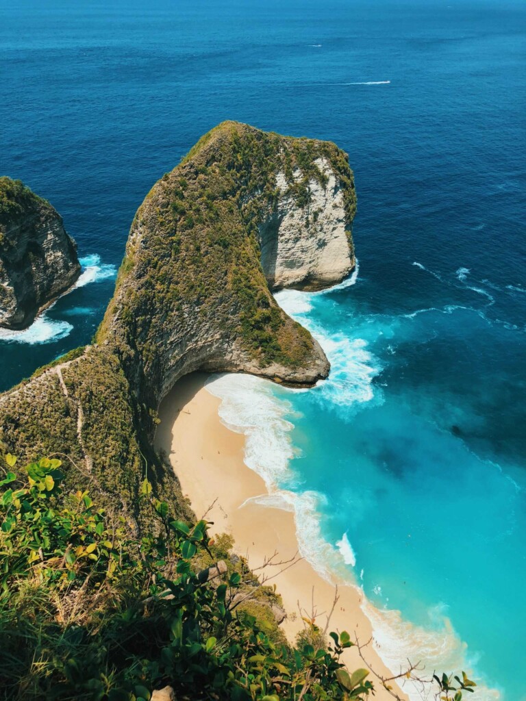 Indonesia travel advice: Aerial view of Kelingking Beach with its unique dinosaur-shaped cliff
