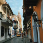 Colombia Travel Itinerary 2 Weeks: Colorful streets of Cartagena de Indias, Colombia, filled with vibrant architecture and cultural charm.