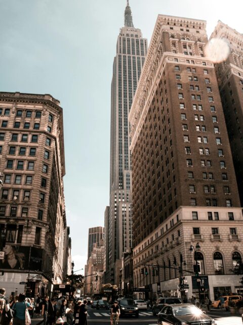 New York Travel Tips: Empire State Building with bustling New York City street below