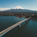 things around mount fuji: Tranquil morning at Lake Kawaguchiko with Mount Fuji in the backdrop