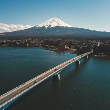 things around mount fuji: Tranquil morning at Lake Kawaguchiko with Mount Fuji in the backdrop